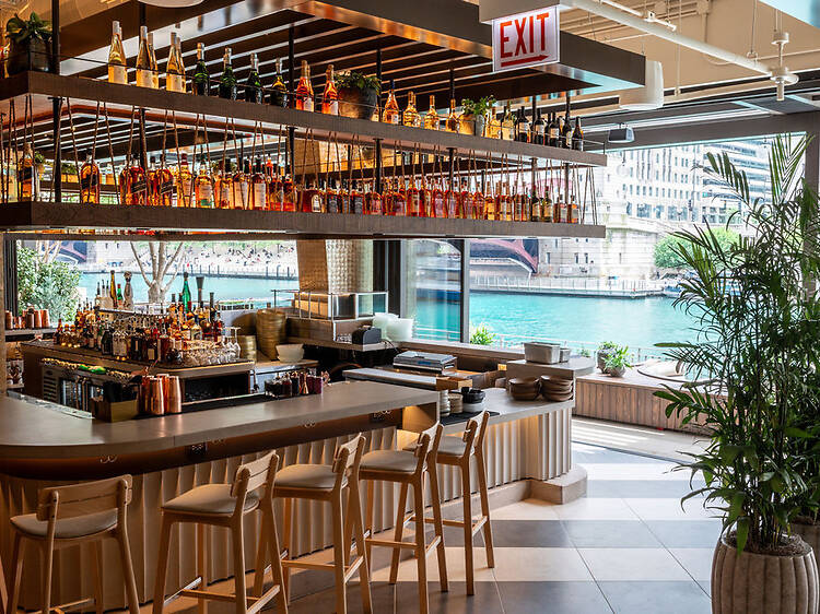 You can take a boat to NAIA, the giant new restaurant on the Chicago River